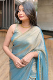 Glittering Firozi Fancy Silk Saree With Delightful Blouse Piece