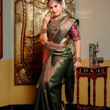 Your Perfect Celebration Look: Green Kanjivaram Saree with Golden Accents