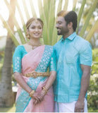 Graceful South Indian Bride in Luxurious Pastel Pink and Teal Silk Saree