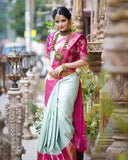 Graceful Charm: Traditional Saree with Vibrant Pink Border and Gold Zari Accents