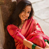 Graceful Pink Soft Silk Kanjivaram Saree with Attractive Matching Border Design