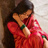 Graceful Pink Soft Silk Kanjivaram Saree with Attractive Matching Border Design