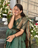 Graceful Green Soft Silk Kanjivaram Saree with Attractive Matching Border